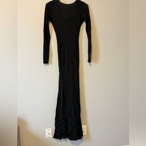 Black maxi open back dress. Never worn.